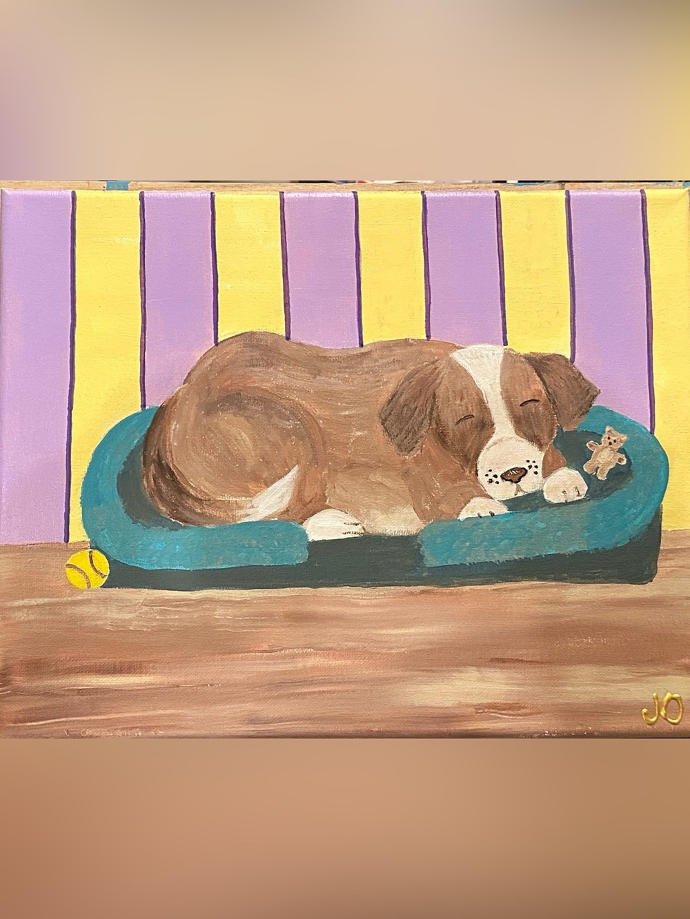 Brown Puppy on Teal Bed
